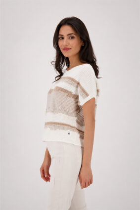 Monari textured mixed sweater in soft beige, cream, and warm camel tones worn by a model.