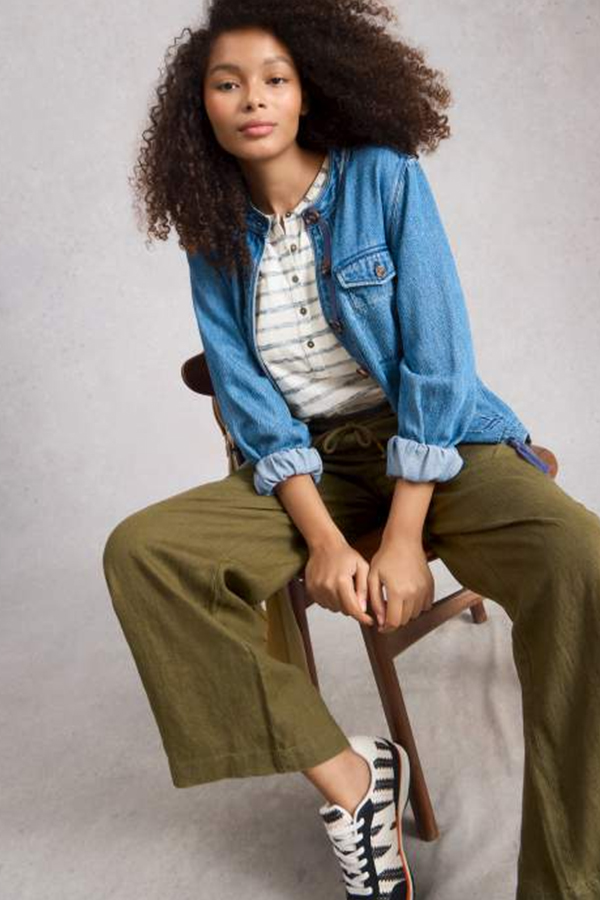 Khaki green wide-leg linen trousers with an elasticated drawstring waistband.