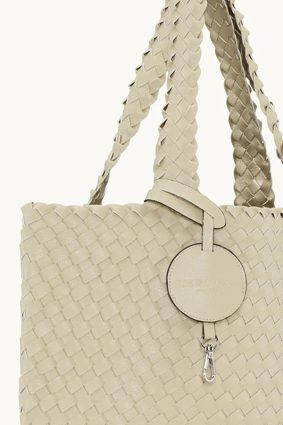 Ivory braided faux leather tote bag by Ilse Jacobsen