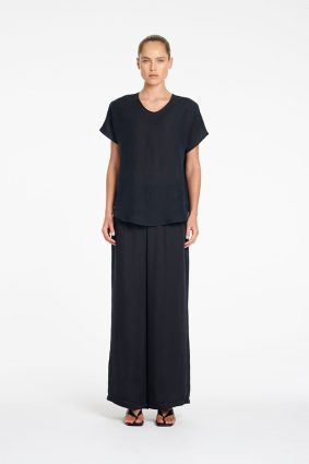 Mela Purdie Neo Shell Shot Navy front view showing V-neckline and short sleeves