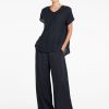 Mela Purdie Neo Shell Shot Navy front view showing V-neckline and short sleeves