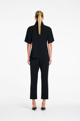 Mela Purdie Powder Zip Pant in True Navy front view showing tapered silhouette and cropped length