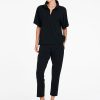 Mela Purdie Powder Zip Pant in True Navy front view showing tapered silhouette and cropped length