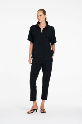 Mela Purdie Powder Zip Pant in True Navy front view showing tapered silhouette and cropped length