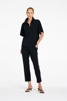 Mela Purdie Powder Zip Pant in True Navy front view showing tapered silhouette and cropped length