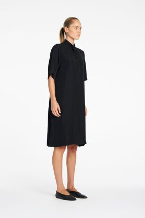 Mela Purdie knee-length plaza dress with stand collar and button tab in navy