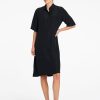Mela Purdie knee-length plaza dress with stand collar and button tab in navy