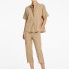 Mela Purdie relaxed short sleeve top with stand collar and button tab in elm