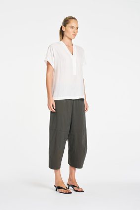 Mela Purdie Wedge Tab Shell in White front view featuring relaxed silhouette and V-neckline