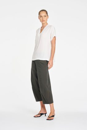 Mela Purdie Wedge Tab Shell in White front view featuring relaxed silhouette and V-neckline