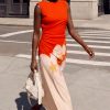 Desigual sleeveless coral and blush maxi dress with an oversized floral print