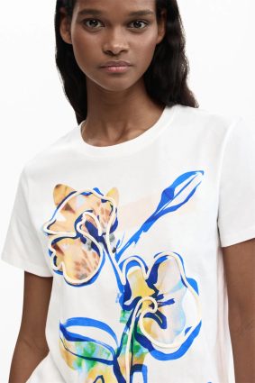 Desigual white short-sleeve tee with vibrant blue, yellow, and green floral print