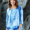 Kokomarina Azura Blouse with round neckline and blue and white abstract print