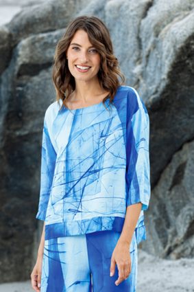 Kokomarina Azura Blouse with round neckline and blue and white abstract print