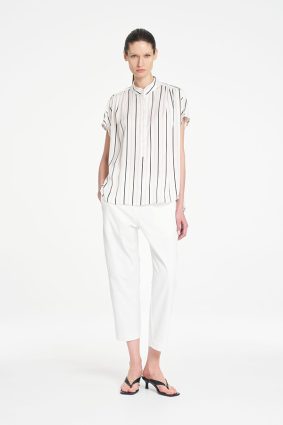 Mela Purdie Bow Pant in Ivory featuring a clean, cropped silhouette and sophisticated tailored design