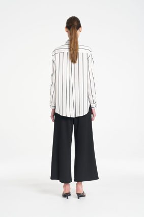 Mela Purdie Crop Suit Pant in classic black featuring a sophisticated wide-leg silhouette and modern cropped length