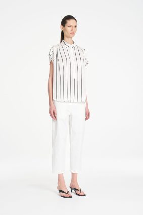 Mela Purdie Gathered Shell top featuring a refined vertical black and white stripe print and soft fluid silhouette