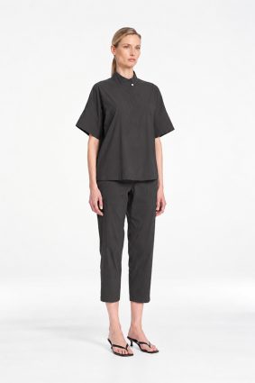 Mela Purdie Tab Shell top in deep bark tone featuring a relaxed silhouette, stand collar, and short sleeves