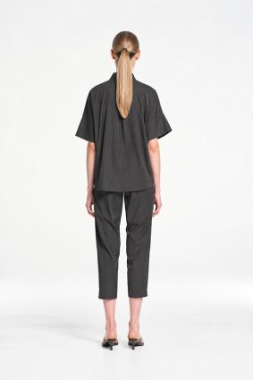 Mela Purdie Tab Shell top in deep bark tone featuring a relaxed silhouette, stand collar, and short sleeves