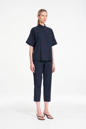 Mela Purdie Tab Shell top in classic French Navy featuring a relaxed silhouette, stand collar, and short sleeves