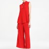 Mela Purdie Tabbard Tank in vibrant papaya featuring a sophisticated sleeveless style, relaxed fluid silhouette, stand collar, and open neckline