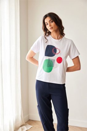 Peruzzi Circle Print T Shirt White featuring a colourful abstract navy, green, and red circle print against a white base.