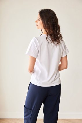 Peruzzi Circle Print T Shirt White featuring a colourful abstract navy, green, and red circle print against a white base.