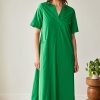 Peruzzi Long Pocket Dress Emerald featuring a relaxed A-line midi silhouette in a vibrant emerald green.