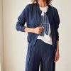 Peruzzi Luxe Jean Jacket Denim featuring a relaxed silhouette in a rich indigo denim look, finished with statement buttons and subtle pocket detailing.