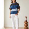 Peruzzi Multi Stripe Top Brown/Rust featuring bold colour blocking in rich blue, brown, and soft neutral tones with short sleeves and a softly structured neckline.