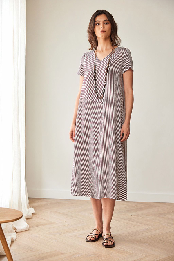 Peruzzi Stripe Dress Brn/Ecru featuring a fine brown and ecru stripe pattern with contrasting stripe directions, short sleeves, and a V-neckline in a relaxed midi length.