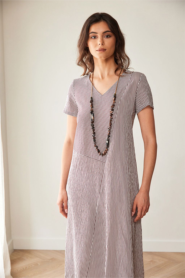 Peruzzi Stripe Dress Brn/Ecru featuring a fine brown and ecru stripe pattern with contrasting stripe directions, short sleeves, and a V-neckline in a relaxed midi length.