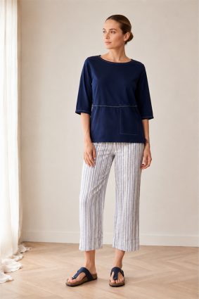 Peruzzi Stripe Trouser Navy featuring a fresh navy and white vertical stripe with a flattering cropped, wide-leg silhouette and statement turn-up cuffs.