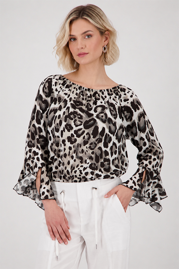Monari leopard print blouse in coffee, black and cream tones with round neckline and ruffle cuffs