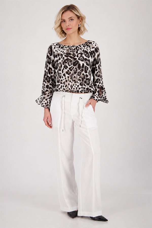 Monari leopard print blouse in coffee, black and cream tones with round neckline and ruffle cuffs