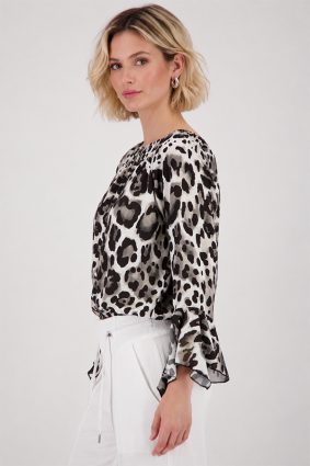 Monari leopard print blouse in coffee, black and cream tones with round neckline and ruffle cuffs